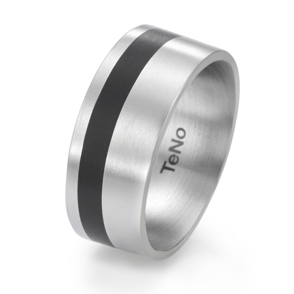 Fingerring Der TeNo Design Ring YuMa verkörpert moderne Ästhetik und innovative Materialkombination. Gefertigt aus hochwertigem Edelstahl, wird sein markantes Design durch ein eingearbeitetes Keramikinlay in tiefem Schwarz akzentuiert. Die gebürstete Oberfläche verleiht dem Ring eine dezente Eleganz, während die abgerundete Innenform für hohen Tragekomfort sorgt. Ein stilvoller Herrenring, der Minimalismus mit maskuliner Stärke verbindet - perfekt für den Alltag oder als charaktervolles Statement-Piece.

 064.1000.D30.XX