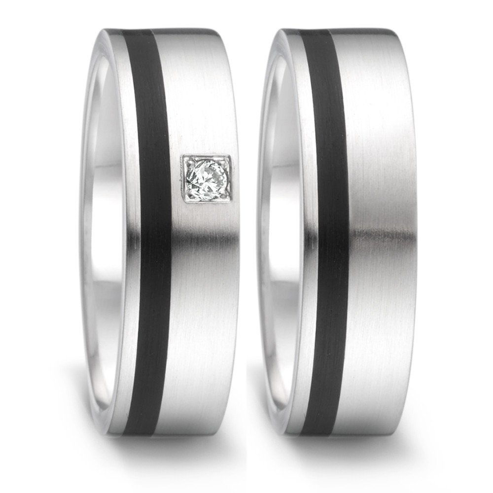 Partnerring Dieser moderne Damen-Partnerring von TeNo verbindet minimalistisches Design mit innovativen Materialien. Gefertigt aus hochwertigem Edelstahl, wird die klare Form durch eine elegante Keramikeinlage akzentuiert. Ein funkelnder Brillant setzt einen dezenten, aber wirkungsvollen Akzent. Die seidenmatte Oberfläche unterstreicht die zeitlose Ästhetik dieses Rings, der für stilbewusste Individualität steht.
 064.13P01.D30.XX