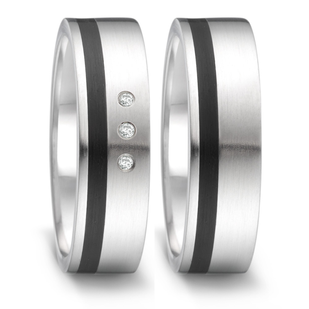 Partnerring Dieser moderne Damen-Partnerring von TeNo verbindet minimalistisches Design mit innovativen Materialien. Gefertigt aus hochwertigem Edelstahl, wird die klare Form durch eine elegante Keramikeinlage akzentuiert. Funkelnde Brillanten setzen einen dezenten, aber wirkungsvollen Akzent. Die seidenmatte Oberfläche unterstreicht die zeitlose Ästhetik dieses Rings, der für stilbewusste Individualität steht.
 064.13S01.D30.XX