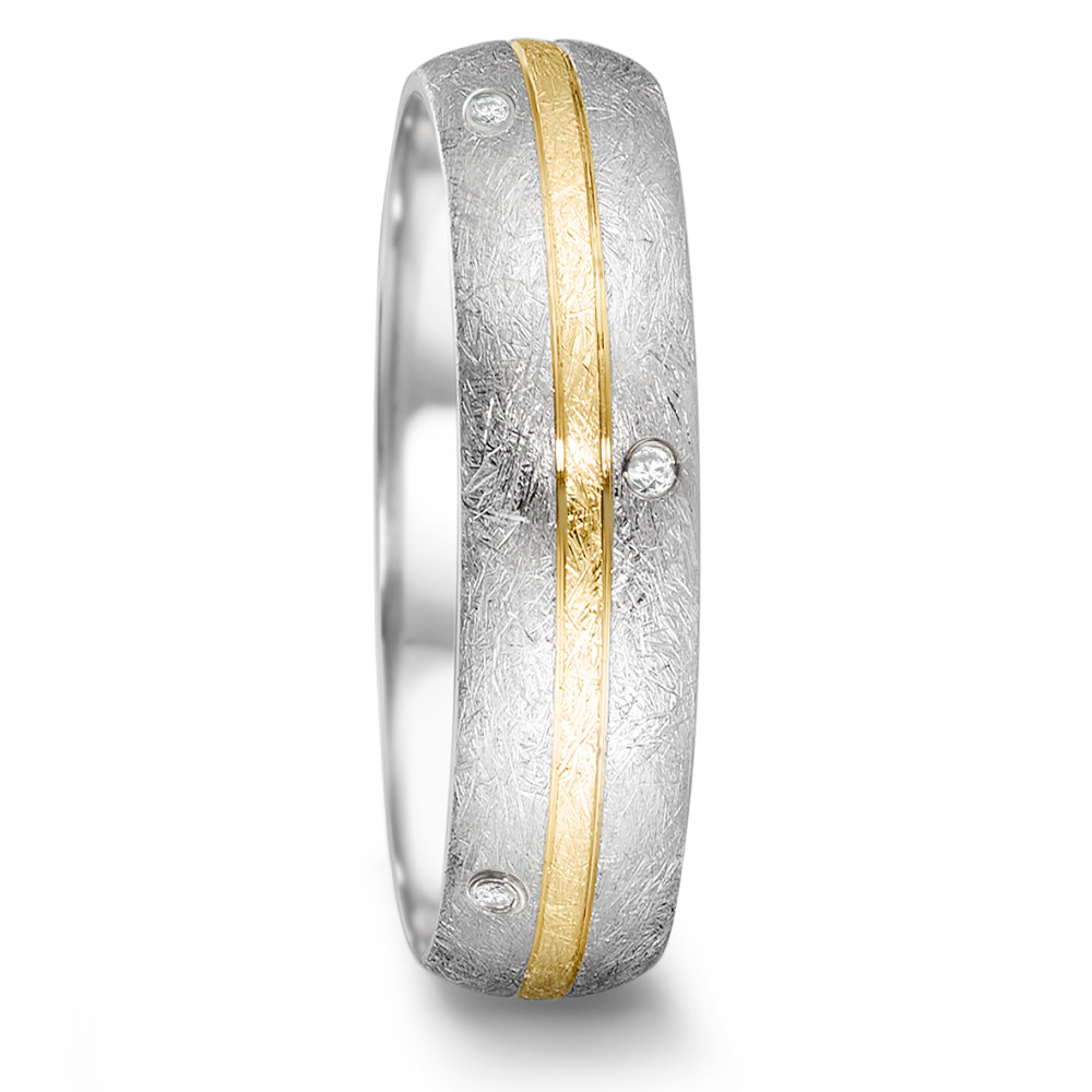 Partnerring Der Partnerring aus der Tamor Kollektion von TeNo vereint puristisches Design mit zeitloser Eleganz. Der Ring besteht aus Edelstahl und 750/18 K Gelbgold in einem eismatten Finish. Er ist ringsum mit 8 Vollschliff Diamanten besetzt, die dem Ring das gewisse Etwas verleihen und für einen Hauch von Luxus sorgen. Durch das eismatte Finish erhält jeder Ring eine individuelle Struktur und wird durch die erfahrene Hand des Feinschmieds zum Unikat! 068.25S01.D56.XX