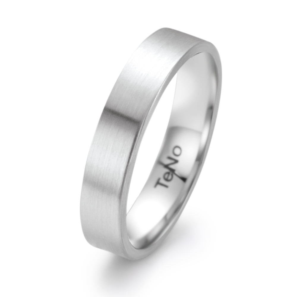 Fingerring Schlicht, klar und kompromisslos modern: Dieser Ring aus mattiertem Edelstahl von TeNo überzeugt durch seine reduzierte Formensprache und präzise Verarbeitung. Ohne Stein und ohne Schnörkel steht er für zeitlose Ästhetik und Understatement. Ein idealer Begleiter für alle, die Wert auf pure Materialien und dezente Eleganz legen - ob als Partnerring oder stilvolles Statement im Alltag.








 069.1800.XX
