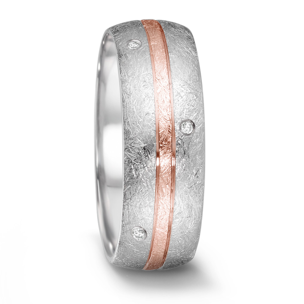 Fingerring Dieser Partnerring aus der Tamor Kollektion von TeNo verkörpert schlichte Eleganz und zeitloses Design. Er besteht aus Edelstahl und 18 Karat Roségold mit einem eismatten Finish und ist mit 8 Vollschliff Diamanten verziert, die eine luxuriöse Note verleihen. Jeder Ring ist ein Unikat mit individueller Struktur, geformt von der erfahrenen Hand des Feinschmieds und langlebiger Begleiter in Freundschaft, Beziehung oder Ehe. Entworfen und hergestellt in Deutschland. 068.26S01.D56RG.XX