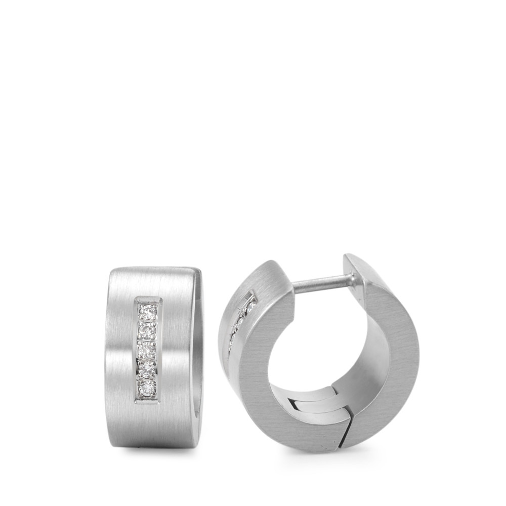 Klappcreolen Diese Klapp-Creolen aus satiniertem Edelstahl von TeNO strahlen schlichte Eleganz aus. Die funkelnden Diamanten auf der Vorderseite setzen dezente, aber eindrucksvolle Akzente. Ihr modernes und reduziertes Design macht sie vielseitig kombinierbar %u2013 ob zu formellen Anlässen oder lässigen Outfits. Besonders in Kombination mit einem schlichten Basic-Shirt verleihen sie jedem Look eine stilvolle, coole Note und lassen sich problemlos in jeden Alltagsstil integrieren. 039.10P01.00