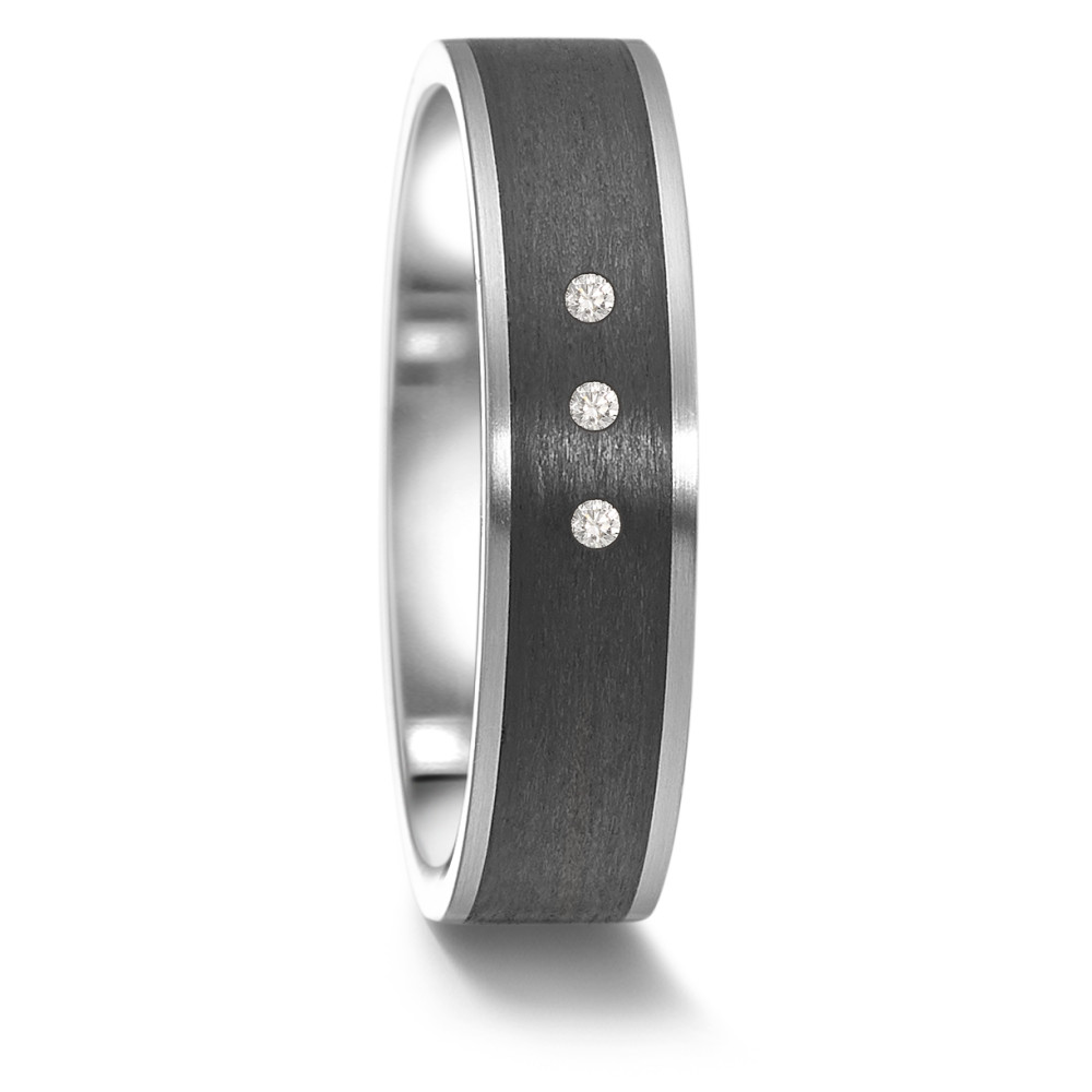 Partnerring Als Symbol einer bedeutungsvollen Beziehung steht dieser TeNo-Partnerring. Sorgfältig gefertigt aus Edelstahl, Carbon und drei funkelnden Diamanten, symbolisiert er die Stärke und Beständigkeit, die in einer solchen Bindung von Bedeutung sind. Ob als Freundschaftsring, Partnerring oder als stilvolles Accessoire für sich selbst, dieser Ring ist immer eine gute Wahl. Hergestellt in deutscher Manufaktur für Trauringe. 
 063.63S01.XX