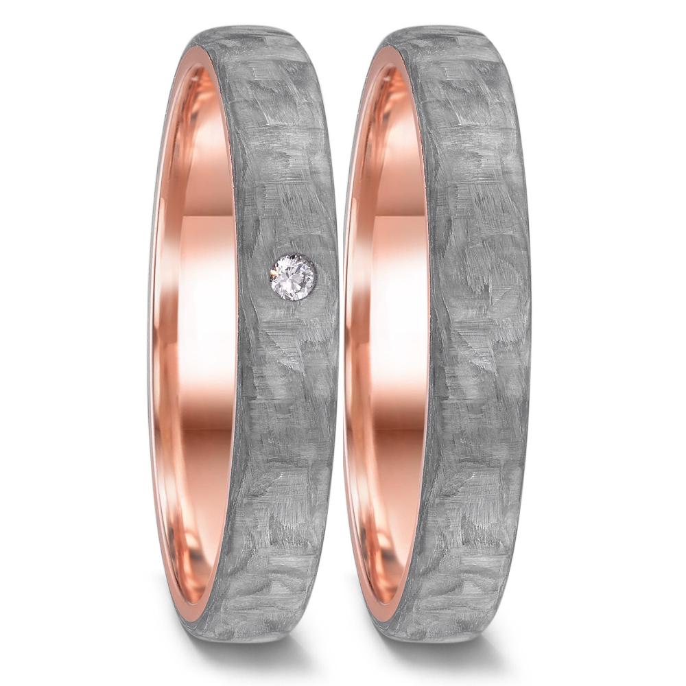 Partnerring TeNo Love Rings sind besonders ausgefallene Partnerringe und Trauringe. Durch das schlichte und zeitlose Design sind diese Manufaktur-Ringe für einen modernen Lifestyle wie geschaffen. Beim Modell ECSTATIC wird die massiv goldene Ringschiene mit dem elegantem Grey Carbon fest ummantelt. Zur Auswahl stehen fünf Ringbreiten in 3, 4, 5 und 6 mm sowie über 500 Diamant Varianten. 52659/001/DA3/N579