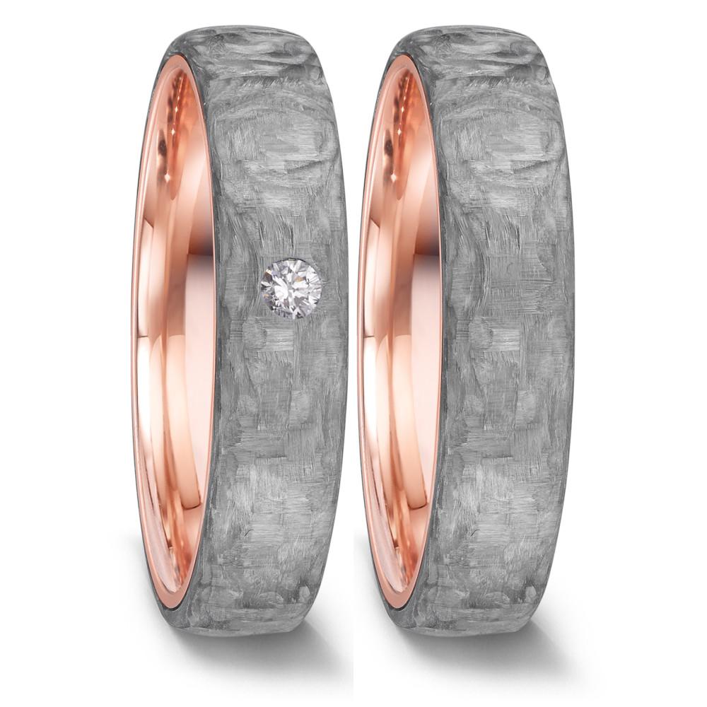 Partnerring TeNo Love Rings sind besonders ausgefallene Partnerringe und Trauringe. Durch das schlichte und zeitlose Design sind diese Manufaktur-Ringe für einen modernen Lifestyle wie geschaffen. Beim Modell ECSTATIC wird die massiv goldene Ringschiene mit dem elegantem Grey Carbon fest ummantelt. Zur Auswahl stehen fünf Ringbreiten in 3, 4, 5 und 6 mm sowie über 500 Diamant Varianten. 52660/001/DA4/N579