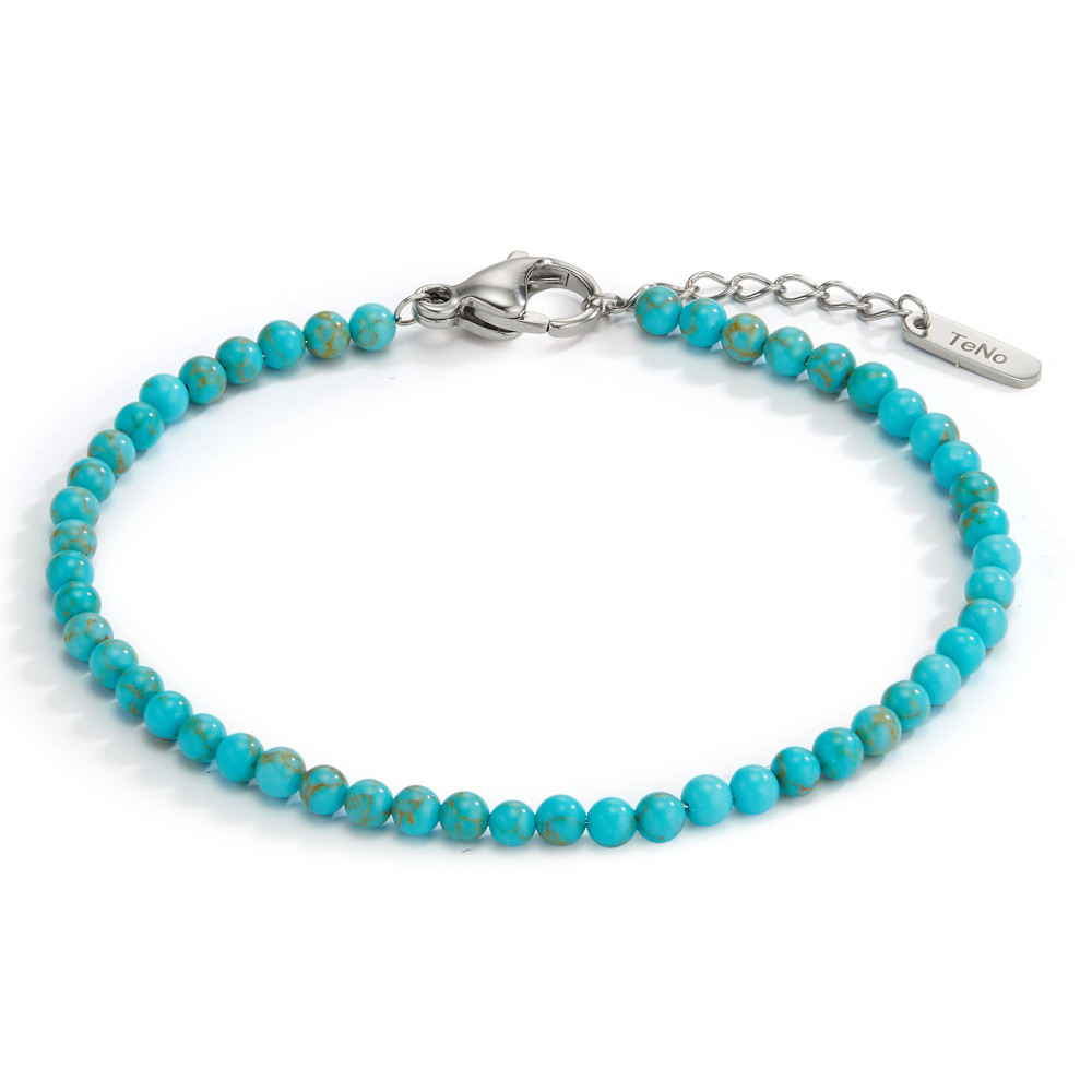 Armband Unaufgeregt und lässig mit Türkis: Das zarte Miyako-Armband mit seinen türkisblauen Halbedelsteinen ist farbenfroher Eyecatcher und Gute-Laune-Macher zugleich. Filigran und minimalistisch eignet es sich perfekt zum vielseitigen Tragen. Der angesagte Layering-Look lässt sich mit dem in Türkis gehaltenen Armband ganz wunderbar mit weiteren TeNo-Bracelets aus den Linien Miyako, Bola sowie Muse zu immer wieder neuen Arrangements mischen. 