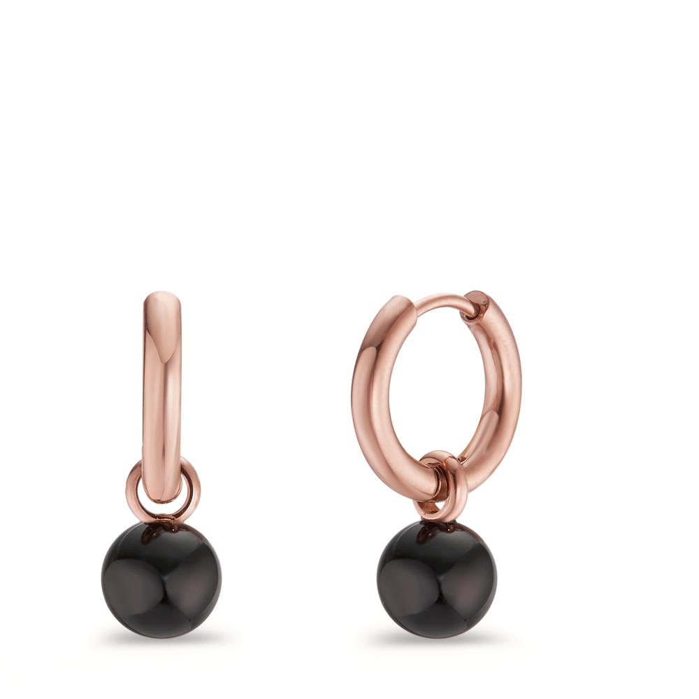 Creolen mit Einhänger Die TeNo Creolen Rosé mit schwarzen Achatperlen sind das perfekte Accessoire für jeden Anlass. Sie sind vielseitig einsetzbar und können sogar ohne Einhänger getragen werden. Die hochwertige Verarbeitung aus recyceltem Edelstahl und die langlebige IP-Beschichtung in der Farbe Roségold machen diesen Schmuck zu einem treuen Begleiter im Alltag und verleihen ihm ein exklusives Finish. 